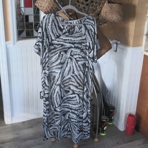 Logo tunic. Beautiful flowing tunic slightly longer in the back.